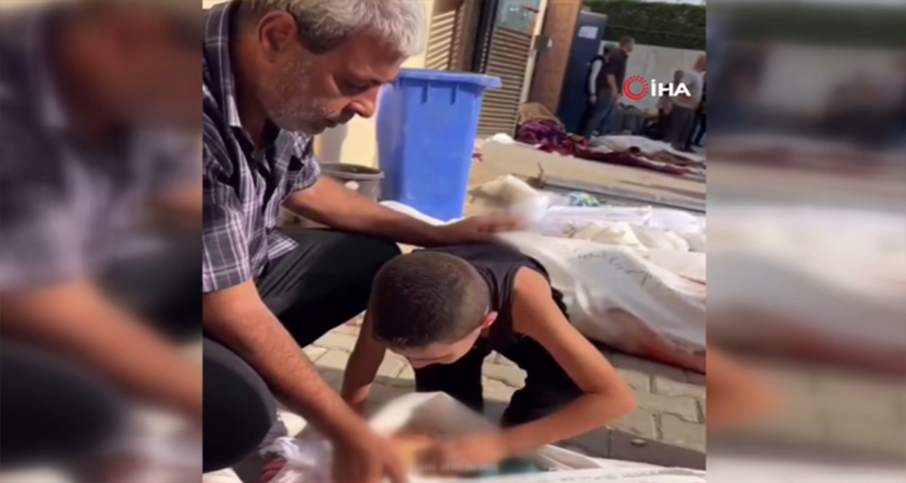Gazze'den acı görüntüler... Filistinli çocuk cansız bedenler arasında ailesini aradı!-1